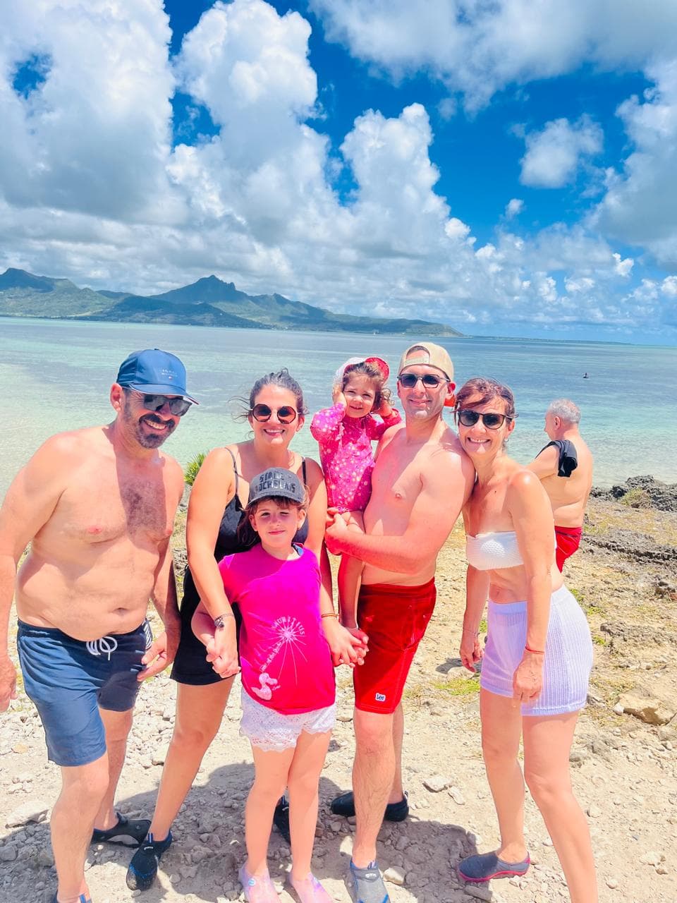 Happy family on beach excursion in Mauritius